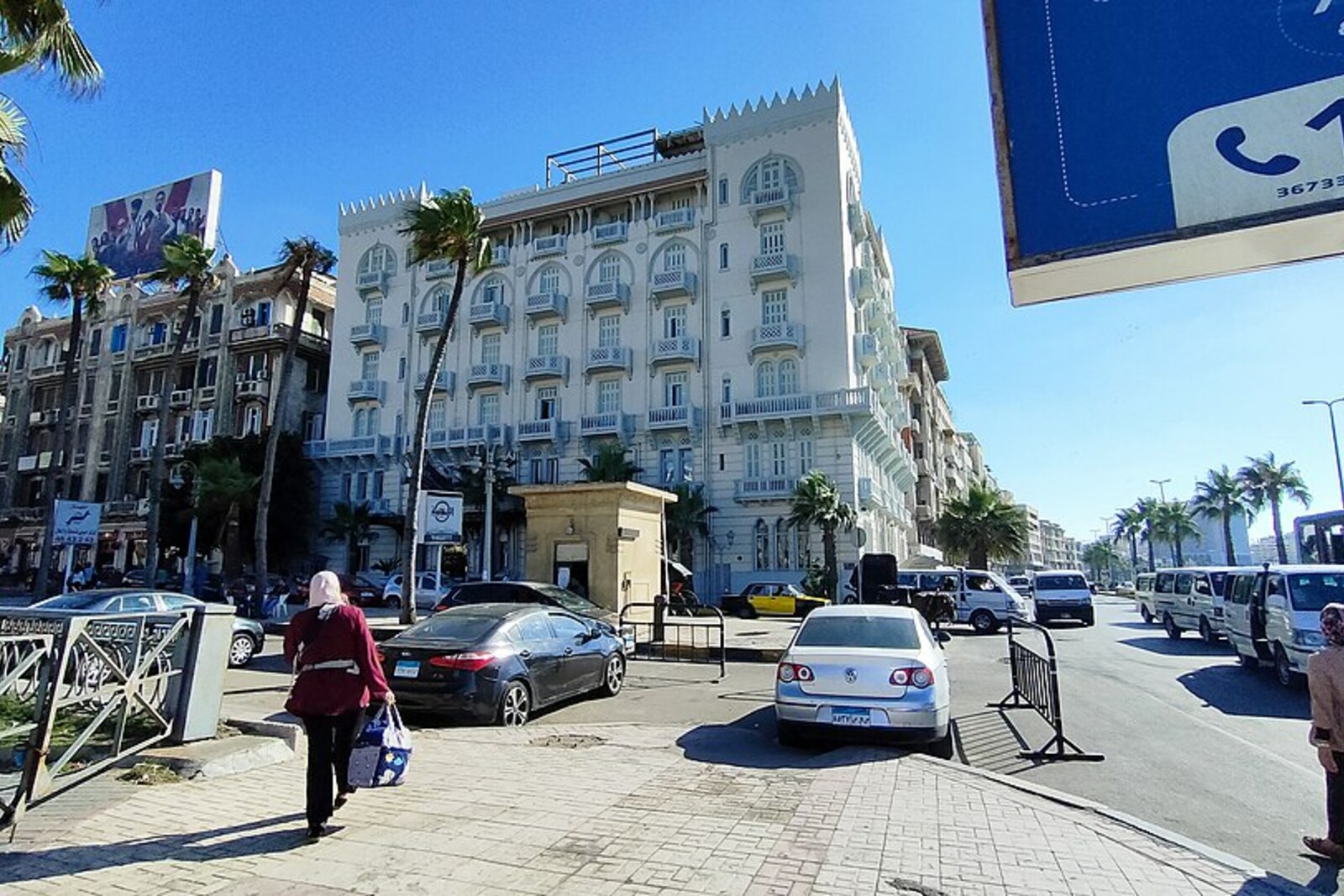 The white façade of the Cecil Hotel by the Eastern Harbour.
