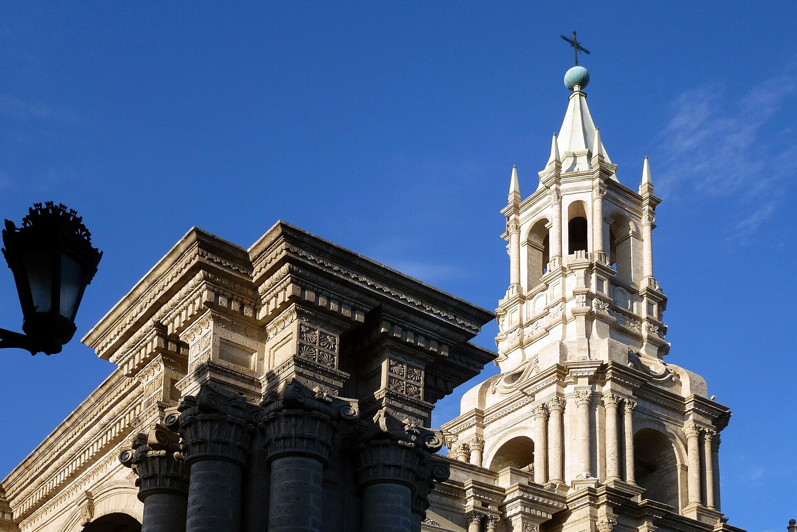 White tower and columns of Arequipa Cathedral.