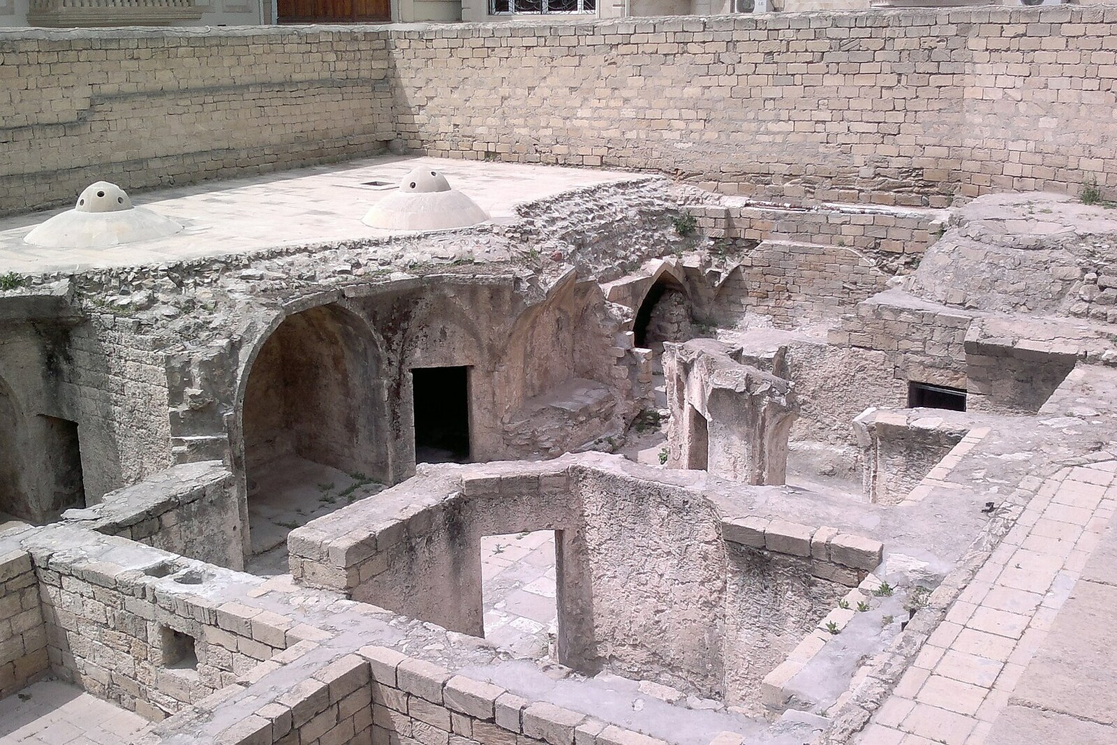 Stone ruins of the sunken bathhouse of the Palace of the Shirvanshahs.