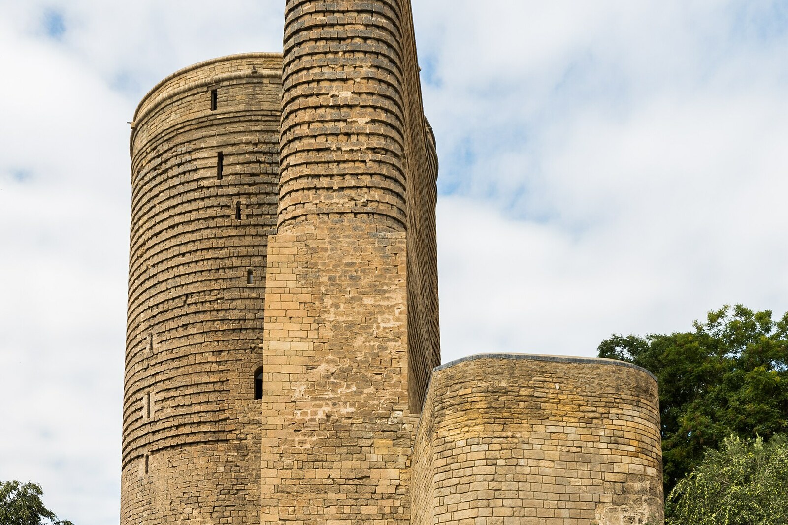 The massive Maiden Tower with a projection on the Caspian Sea side.