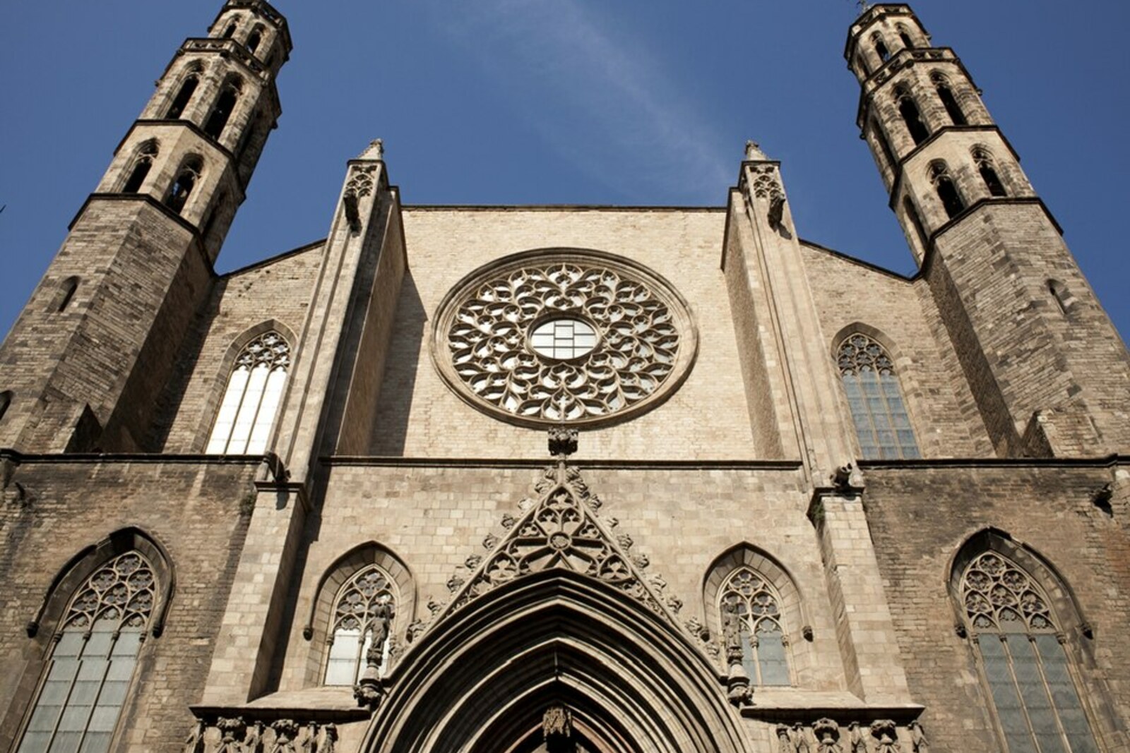 The Gothic façade of Santa Maria del Mar in Barcelona, with two towers
