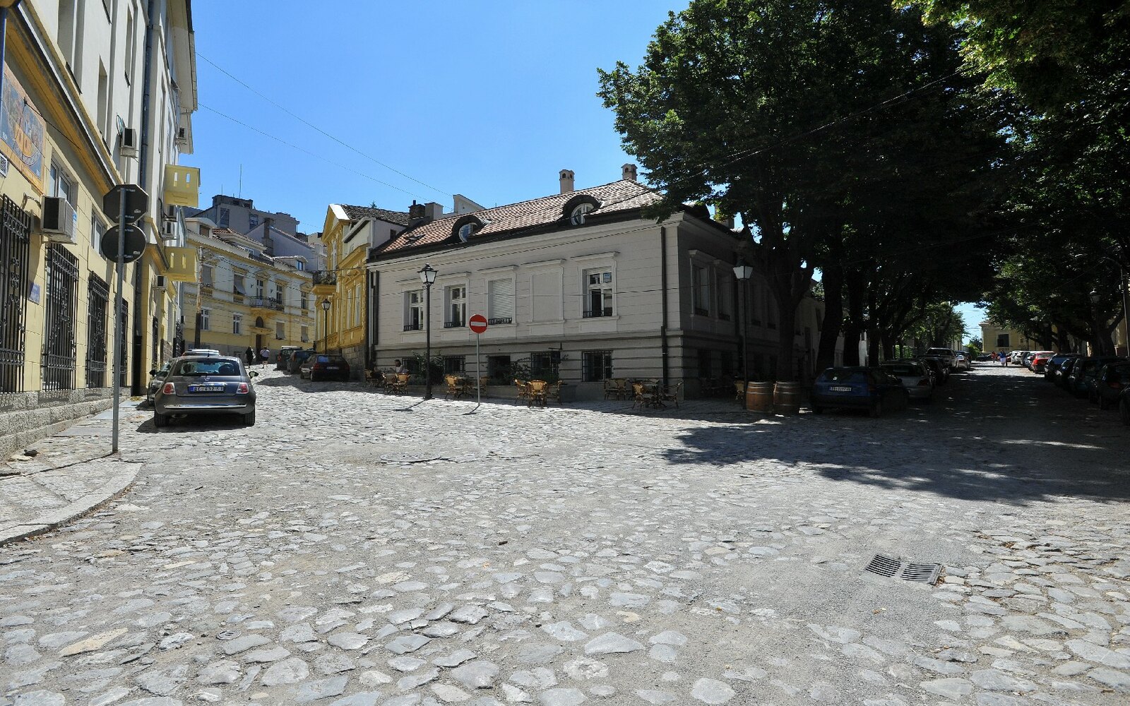 The historic street of Kosančićev Venac with paving and old buildings.