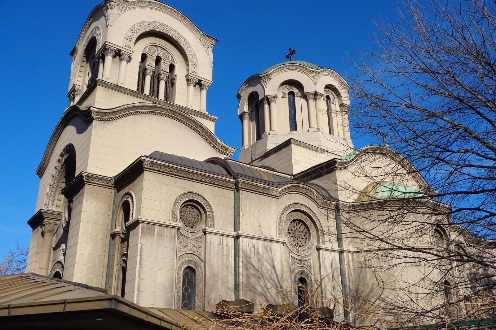 White Orthodox church with a dome and bell tower