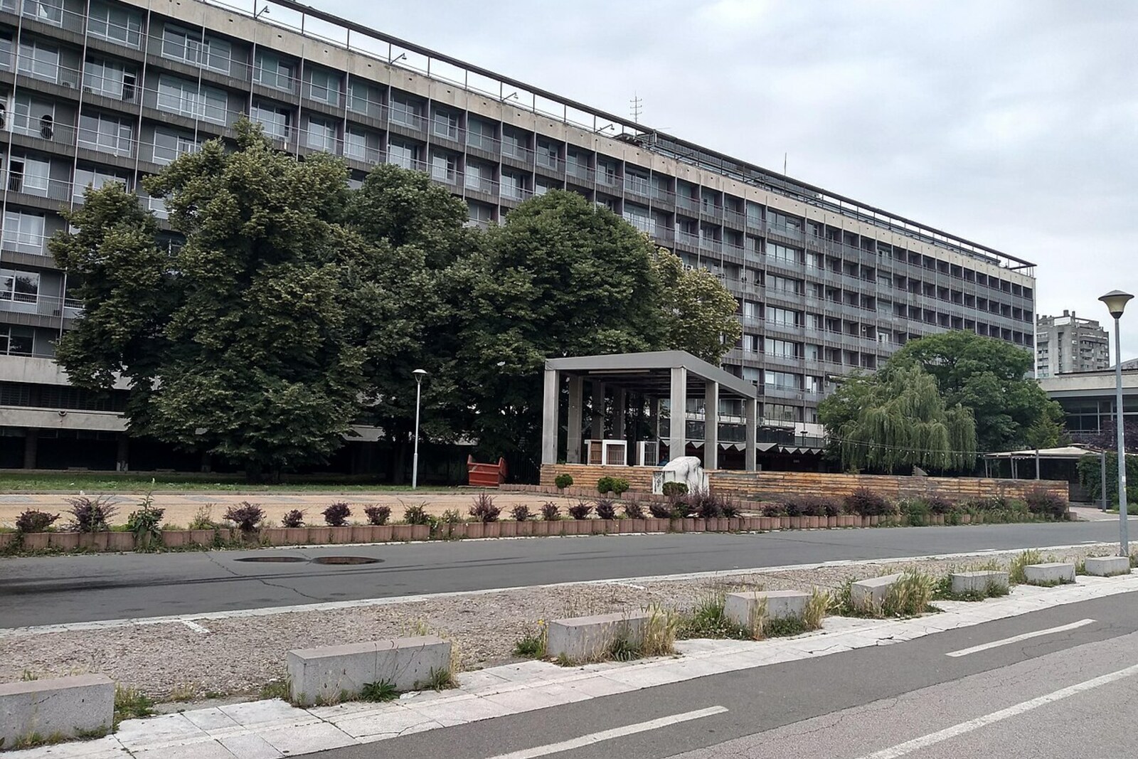 Historic view of Hotel Yugoslavia before demolition; today the site is recognizable as the former hotel site.