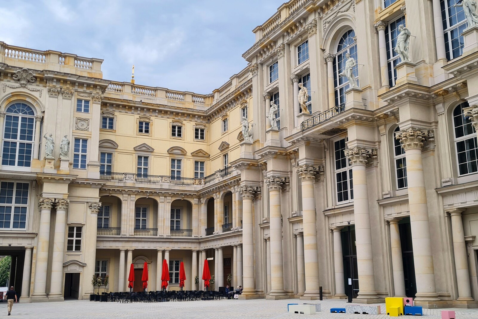 Façade of the reconstructed Berlin Palace / Humboldt Forum with a dome and statues