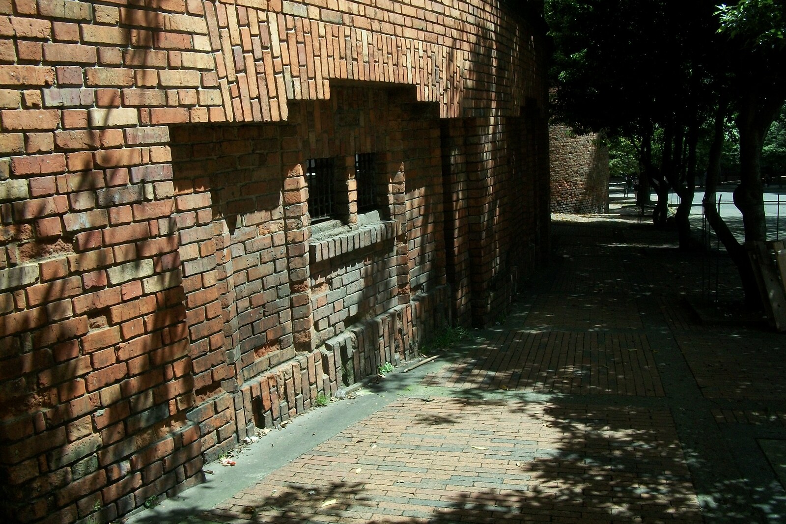 The red-and-yellow brick Santamaría arena with arches and crenellations
