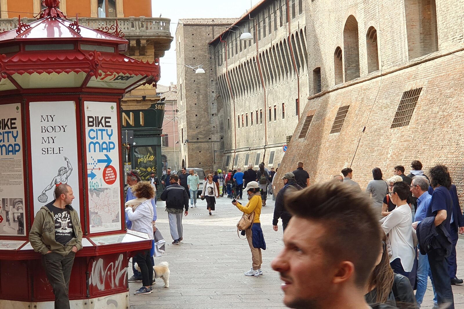 The façade of Palazzo d'Accursio and the entrance area of Salaborsa