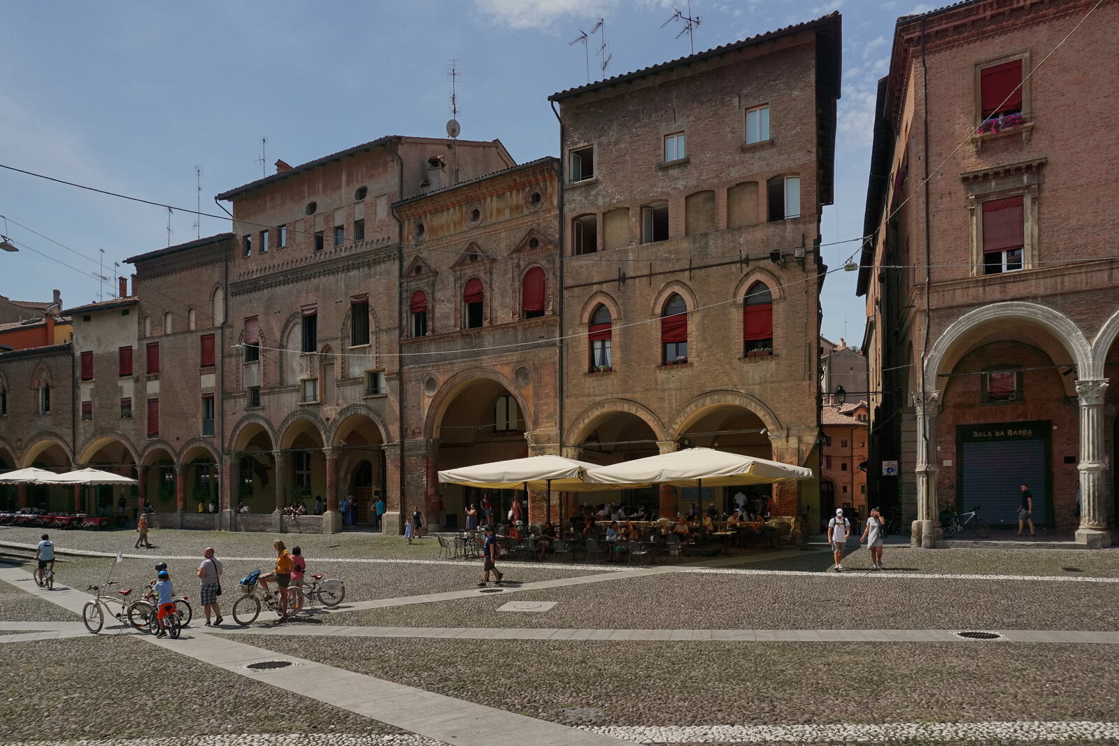Piazza Santo Stefano with brick facades and porticoes