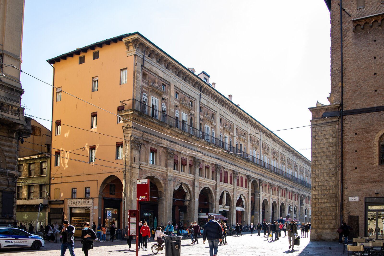Illuminated “Mercato delle Erbe” sign on the market façade
