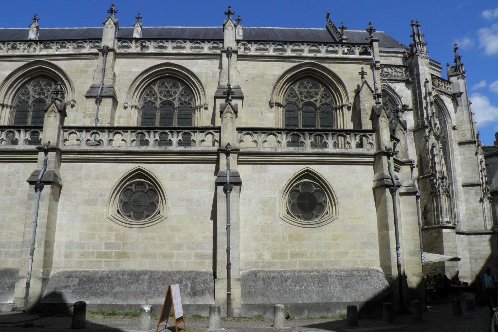 Cafés and Saint-Pierre Church on Place Saint-Pierre in Bordeaux's old port district.