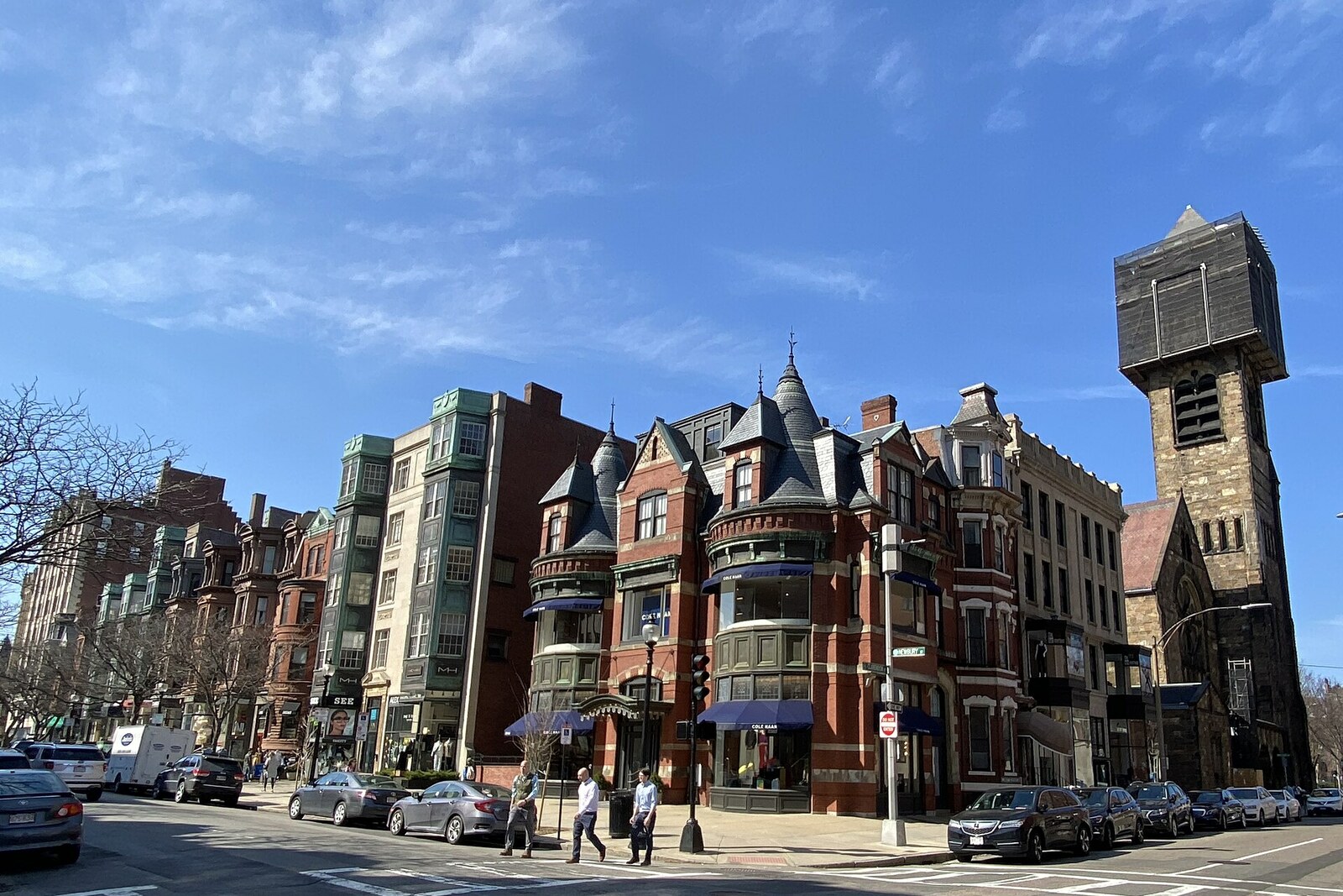 Newbury Street with shop windows and pedestrian traffic in Back Bay.