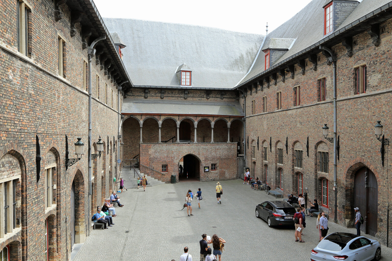 The Belfry of Bruges and medieval market halls on the Markt.