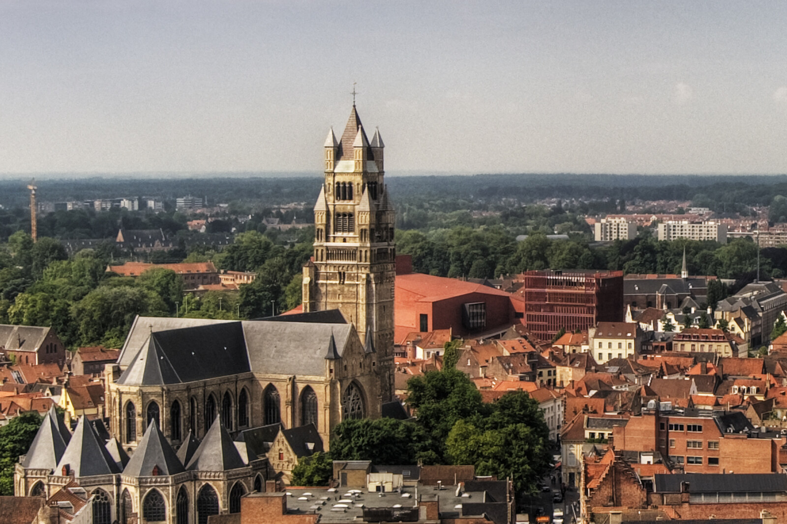 The tower of St Salvator's Church, with a clock and Gothic elements.