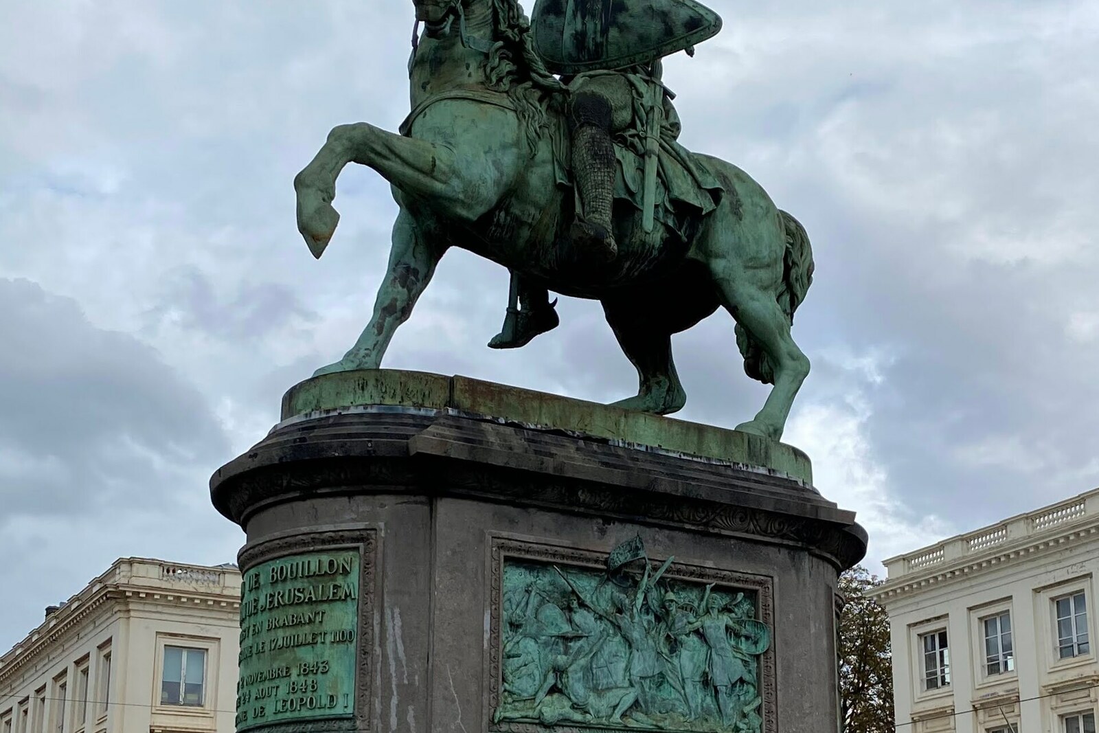 Equestrian statue on Place Royale with the surrounding buildings