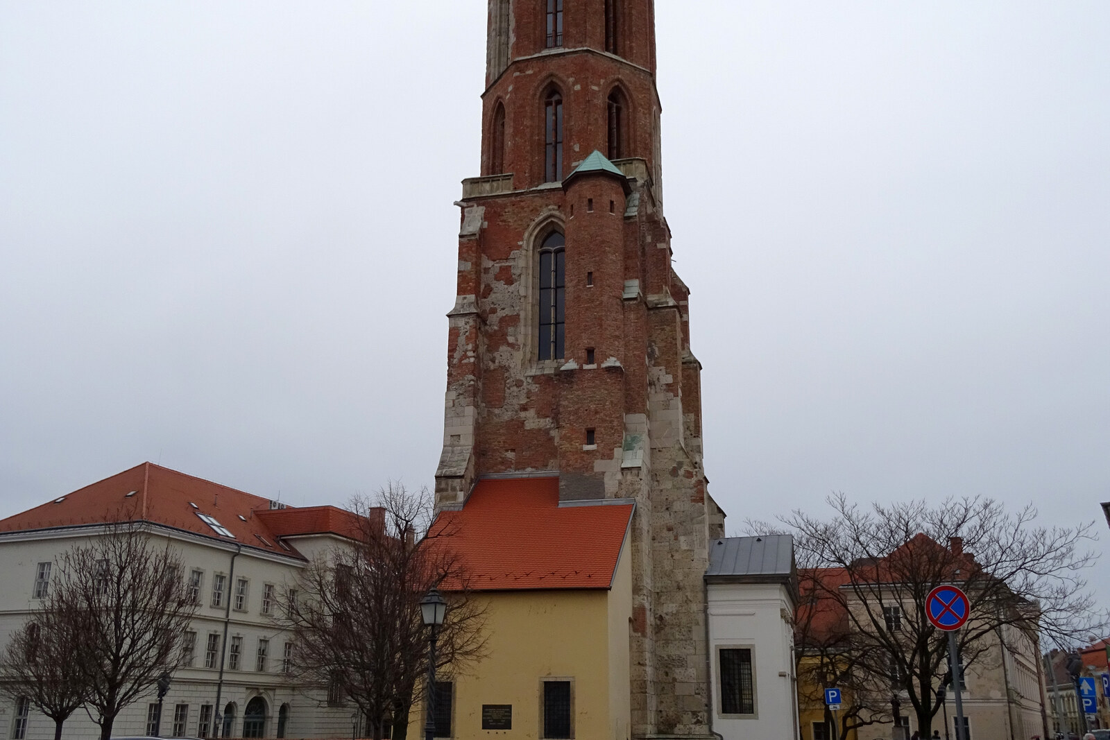 The solitary brick tower of St. Mary Magdalene above the square.
