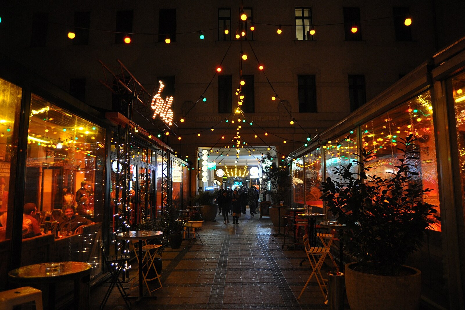 One of the inner courtyards of Gozsdu Courtyard, with arches and modern cafés.