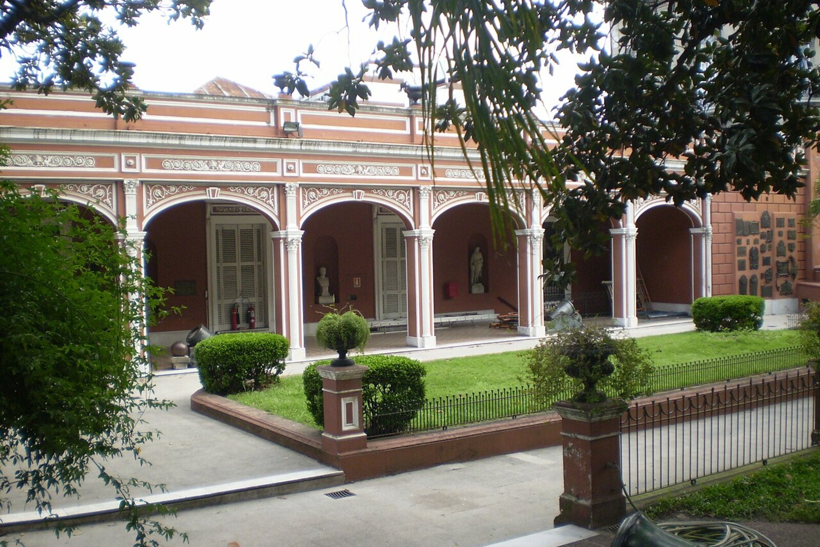 White museum among trees