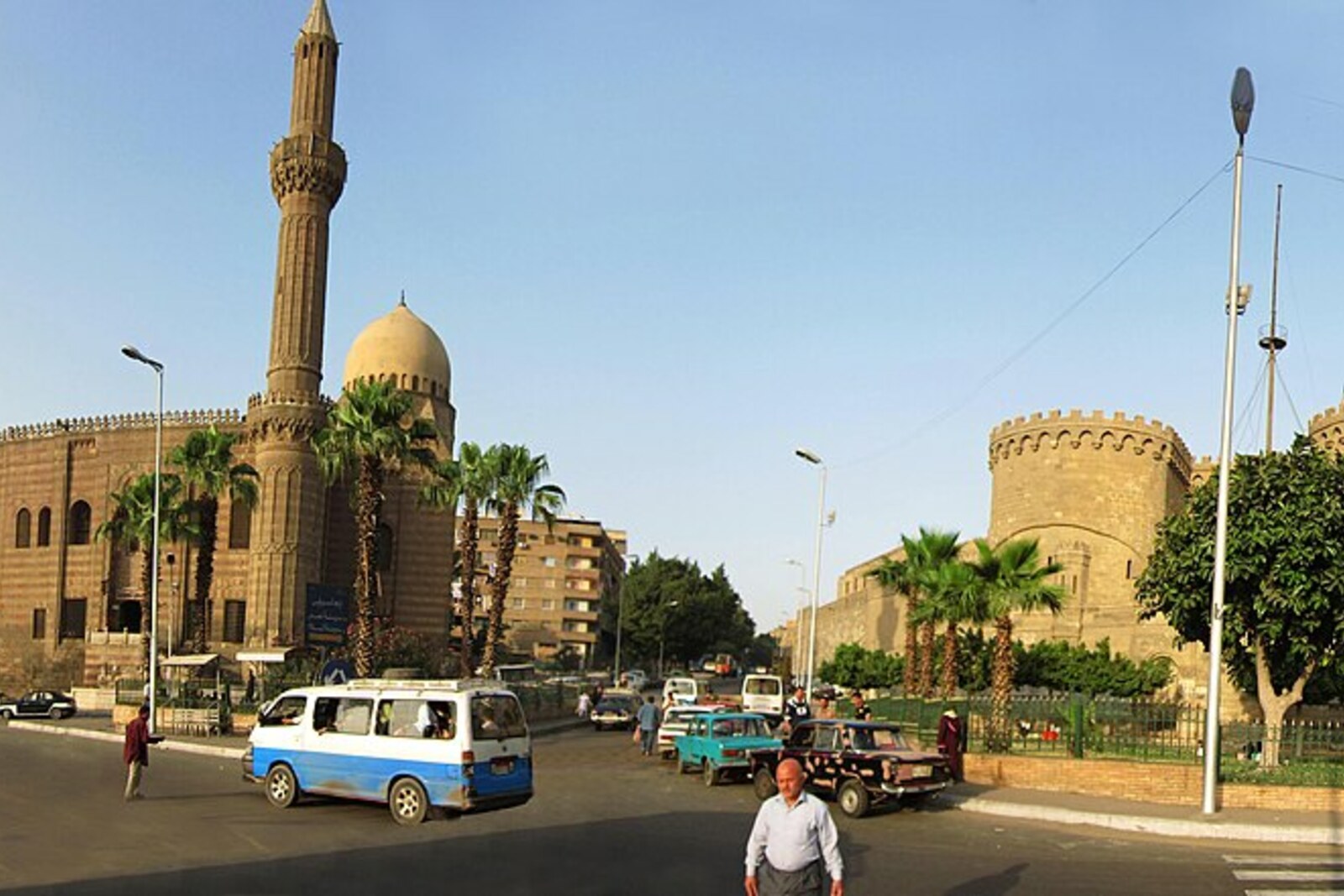 Panoramic view of Salah al-Din Square with the Mosque-Madrasa of Sultan Hassan, Al-Rifa'i Mosque, and the Citadel on the hill.