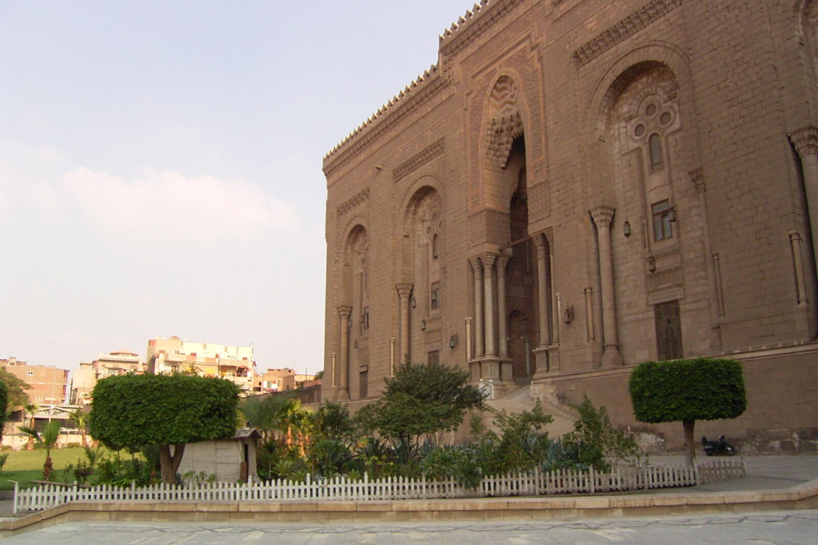 Façade of Al-Rifa'i Mosque with columns and domes.
