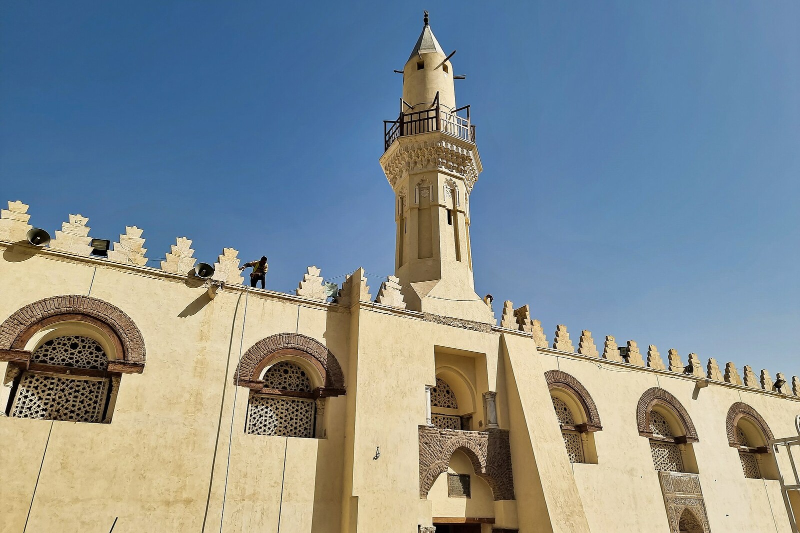 White columns and the minaret of Amr ibn al-As Mosque in Old Cairo