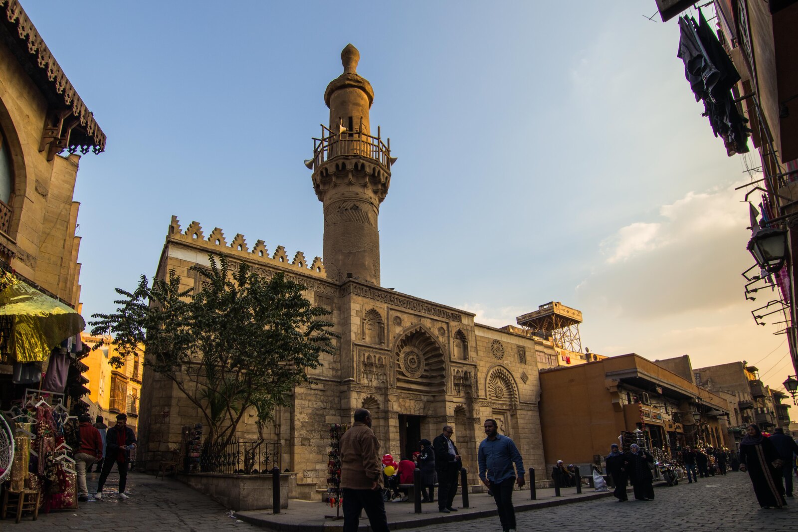 The facade of Al-Aqmar Mosque on Al-Muizz Street in Cairo.