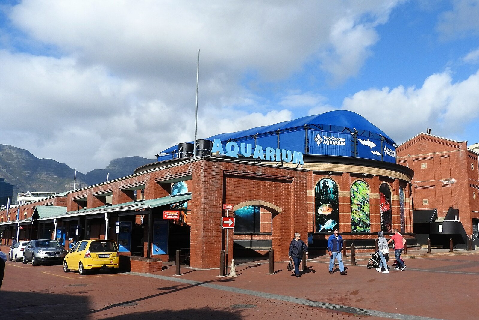 The façade of Two Oceans Aquarium opposite Watershed in the V&A Waterfront; a neighboring landmark, not the market interior.