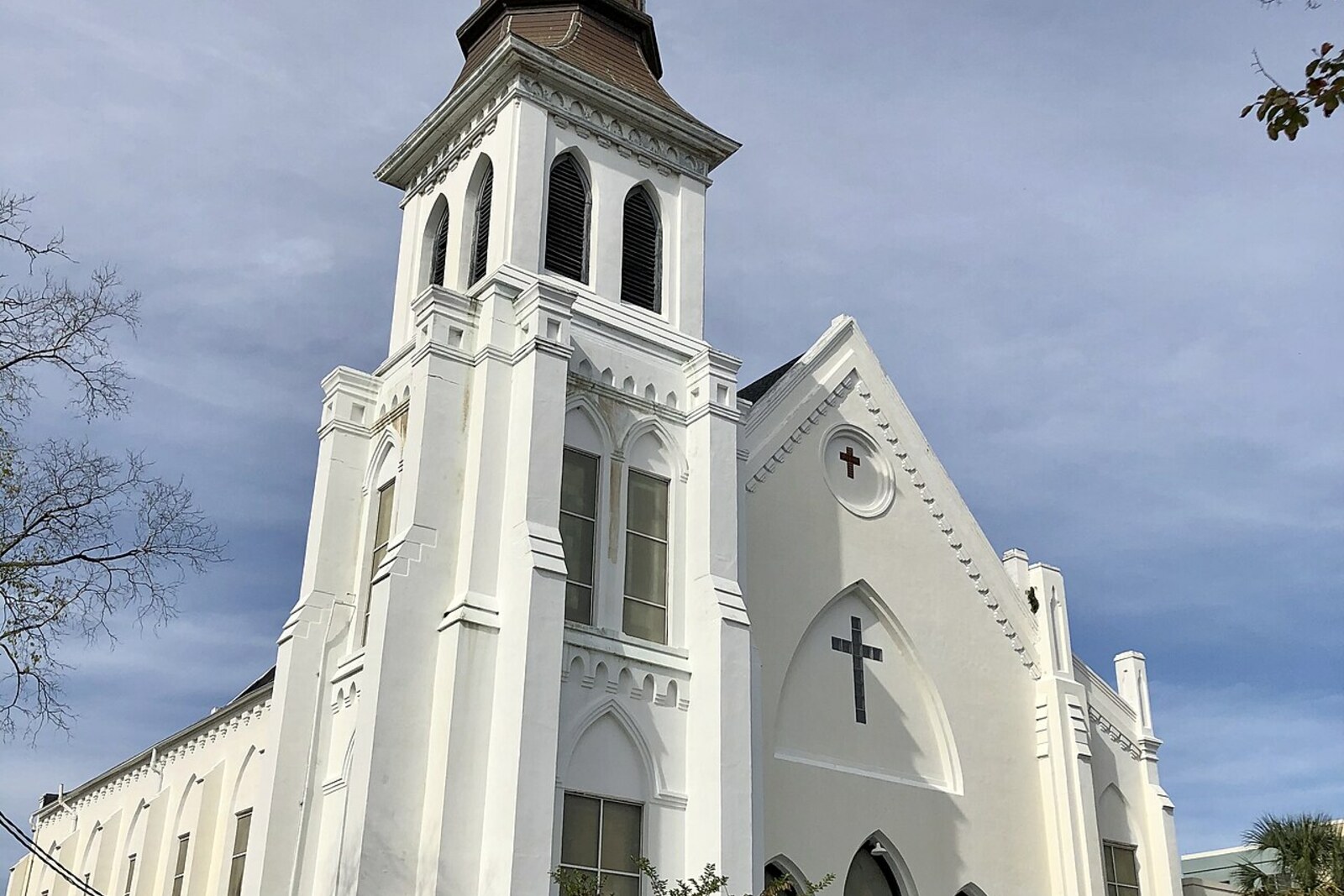 Facade of Mother Emanuel AME Church with a tall bell tower, with no people in close-up.
