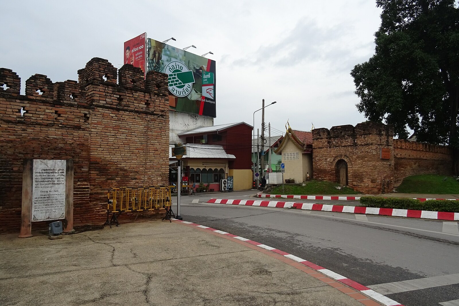 Chiang Mai Gate, made of red brick, beside the southern moat.