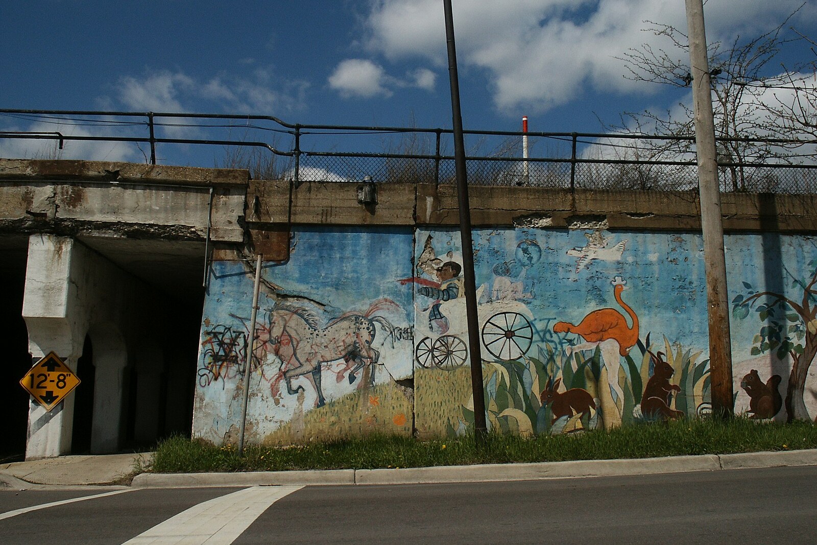 Murals along the railroad embankment on 16th Street in Pilsen.