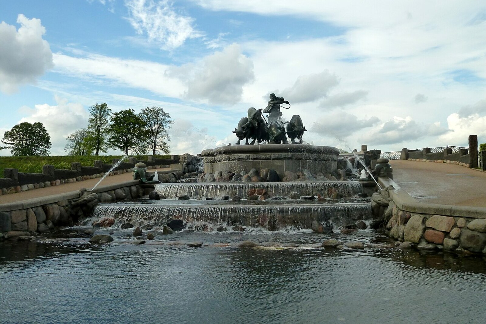 Gefion Fountain in Copenhagen: the goddess and four oxen against the sky