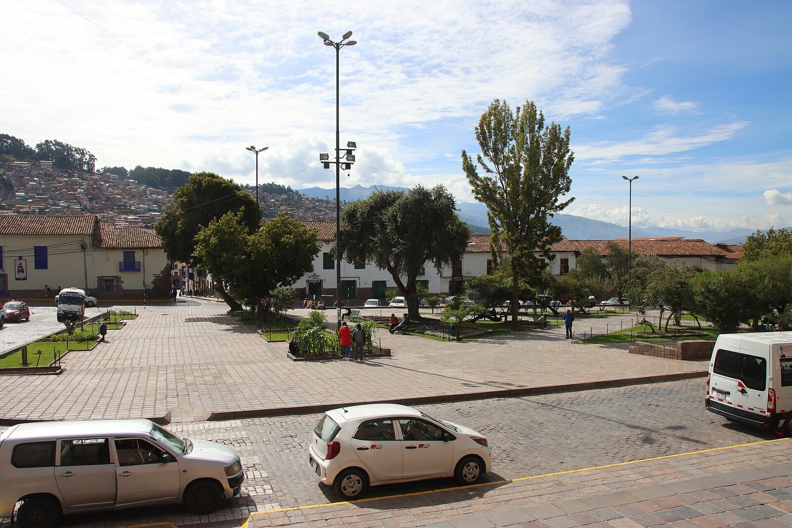 The stone facade of Iglesia de San Francisco in Cusco and part of the square.