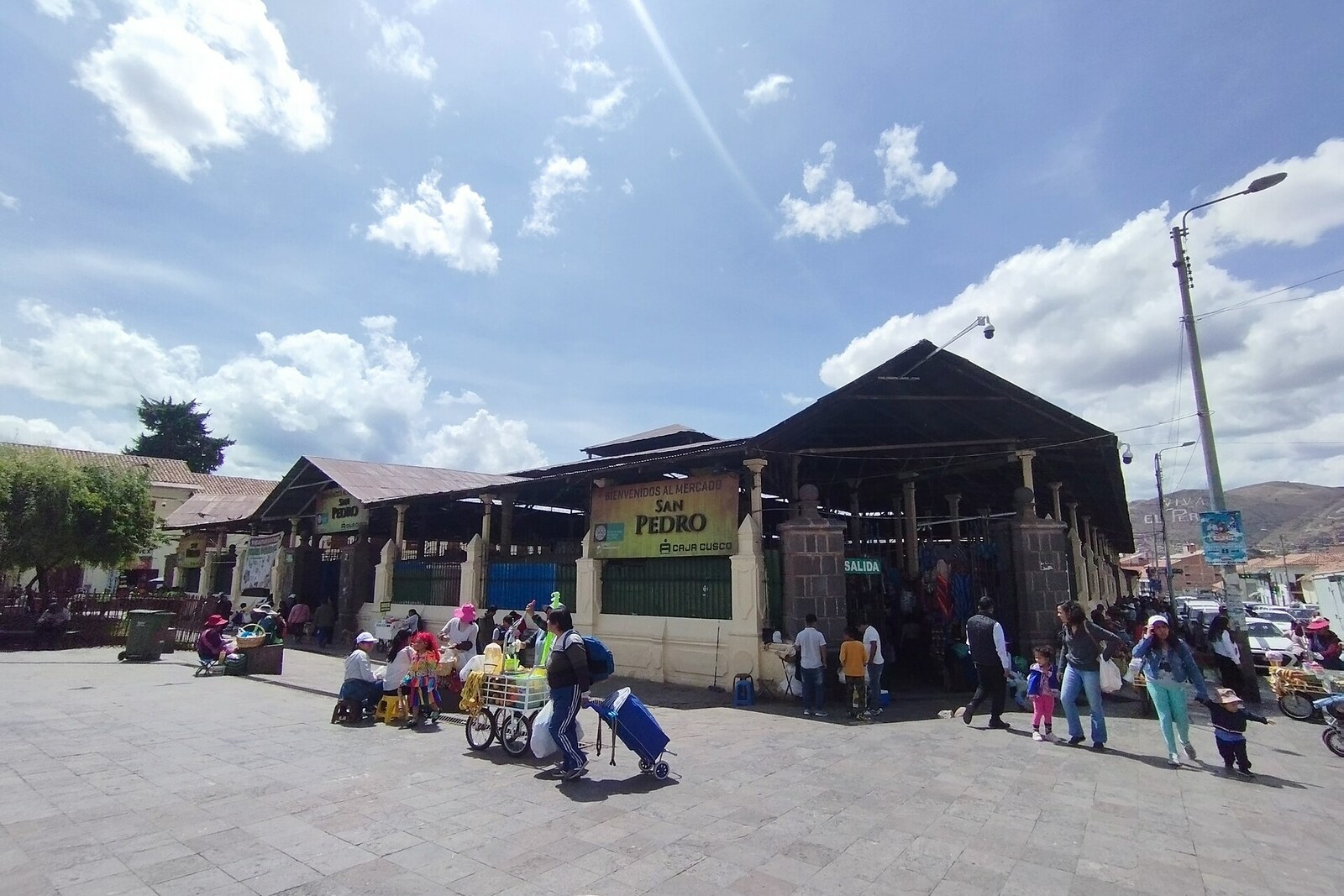 The façade of Mercado Central de San Pedro in Cusco, with an iron canopy.