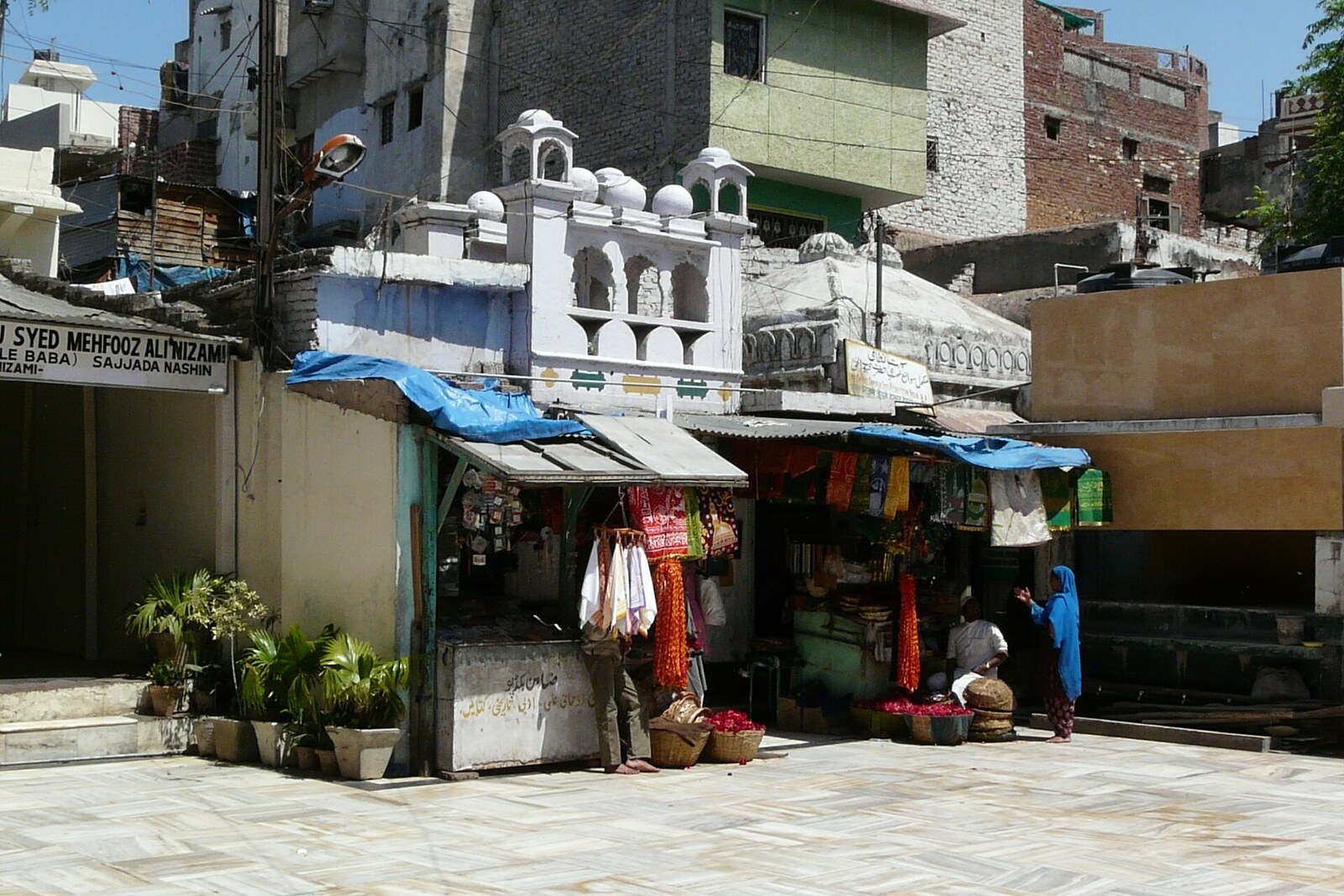 Shops along the edge of the courtyard of Hazrat Nizamuddin Auliya Dargah