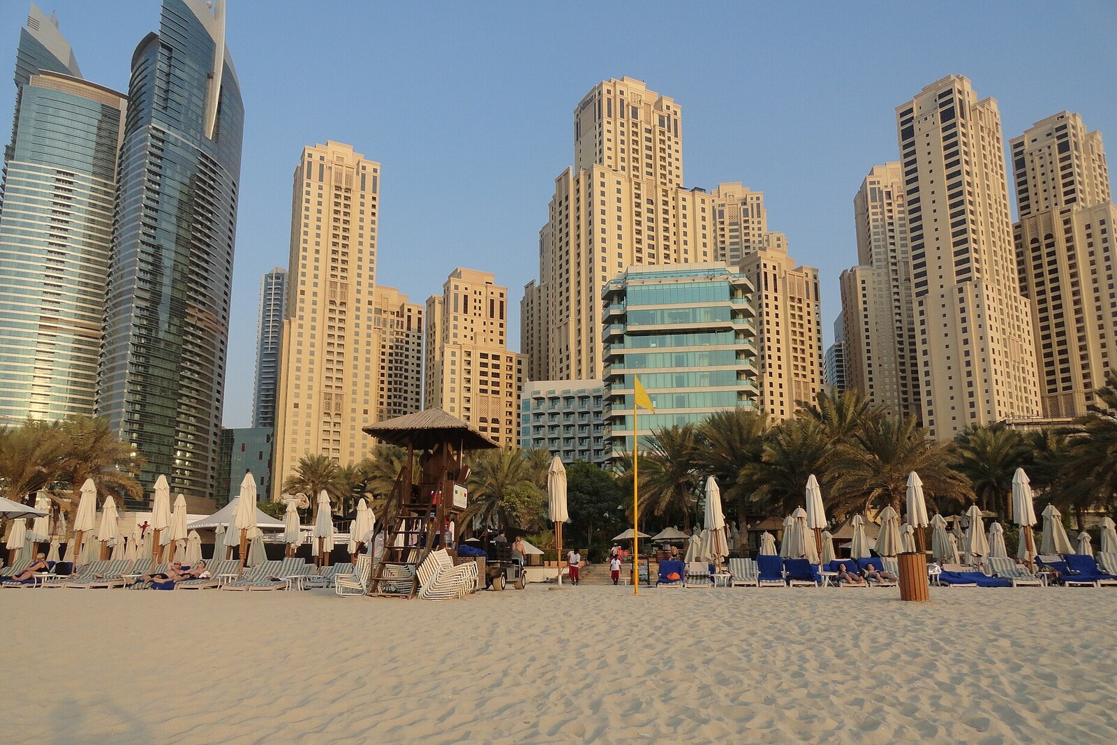 The Beach at JBR, with wooden walkways and high-rise buildings in the background.