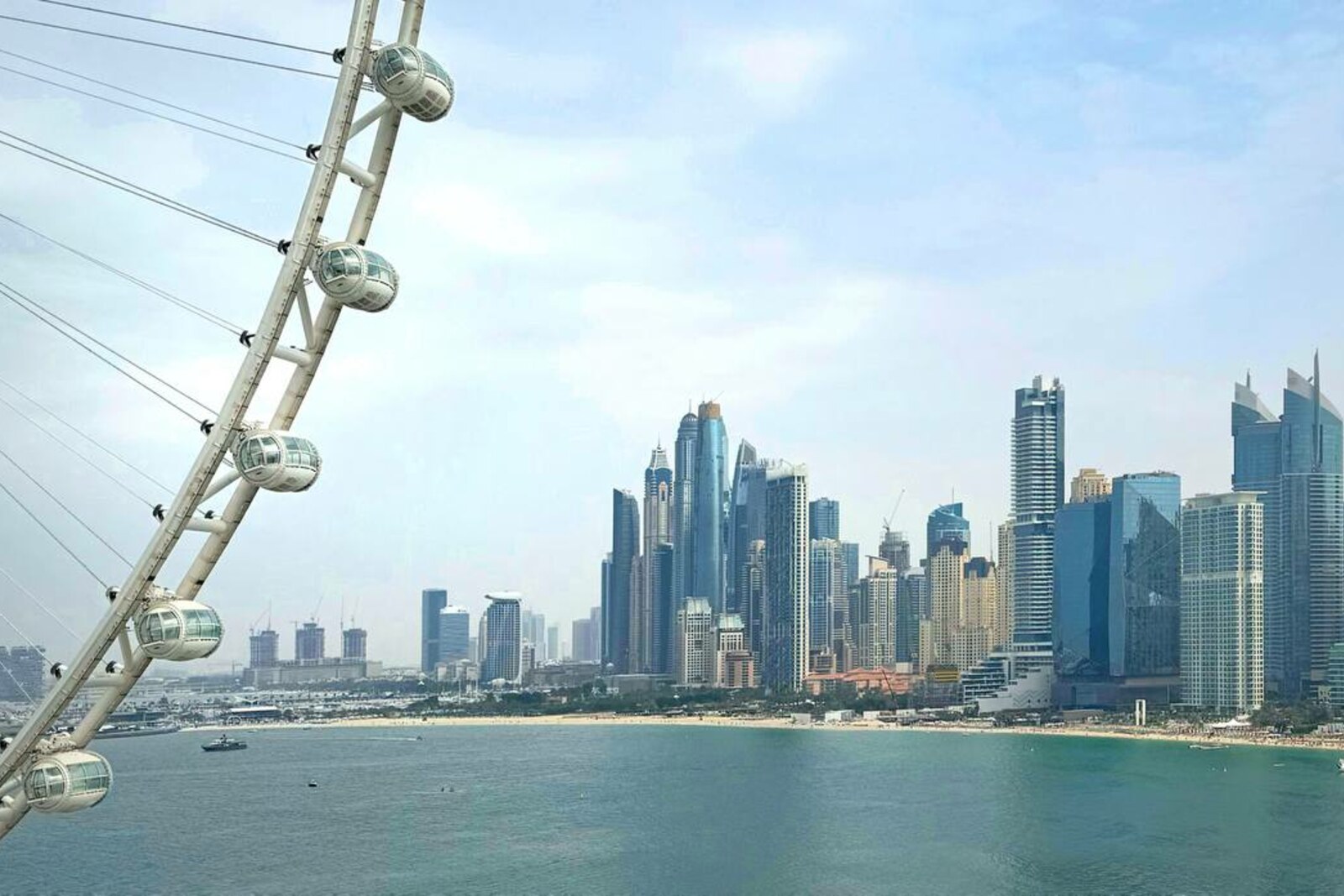 Panoramic view of Dubai Marina and Ain Dubai from Bluewaters Island.