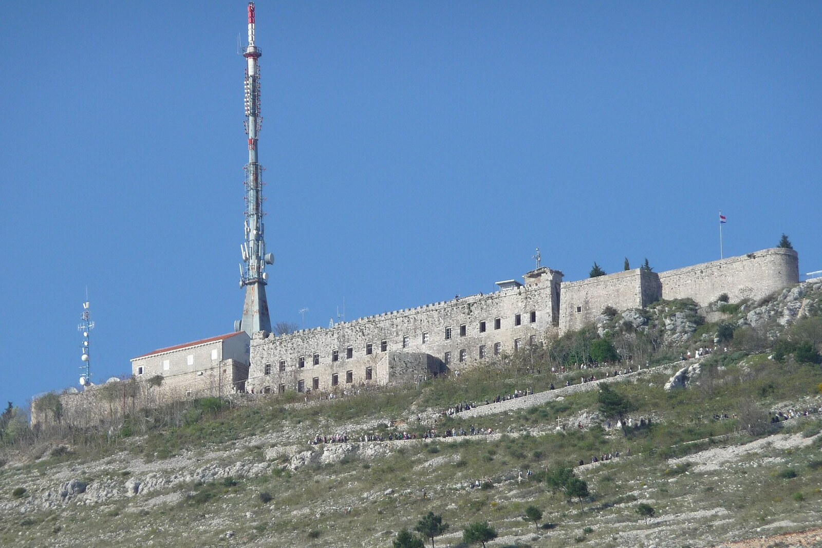 Fort Imperial on the summit of Mount Srđ, with massive stone walls and low trees around it