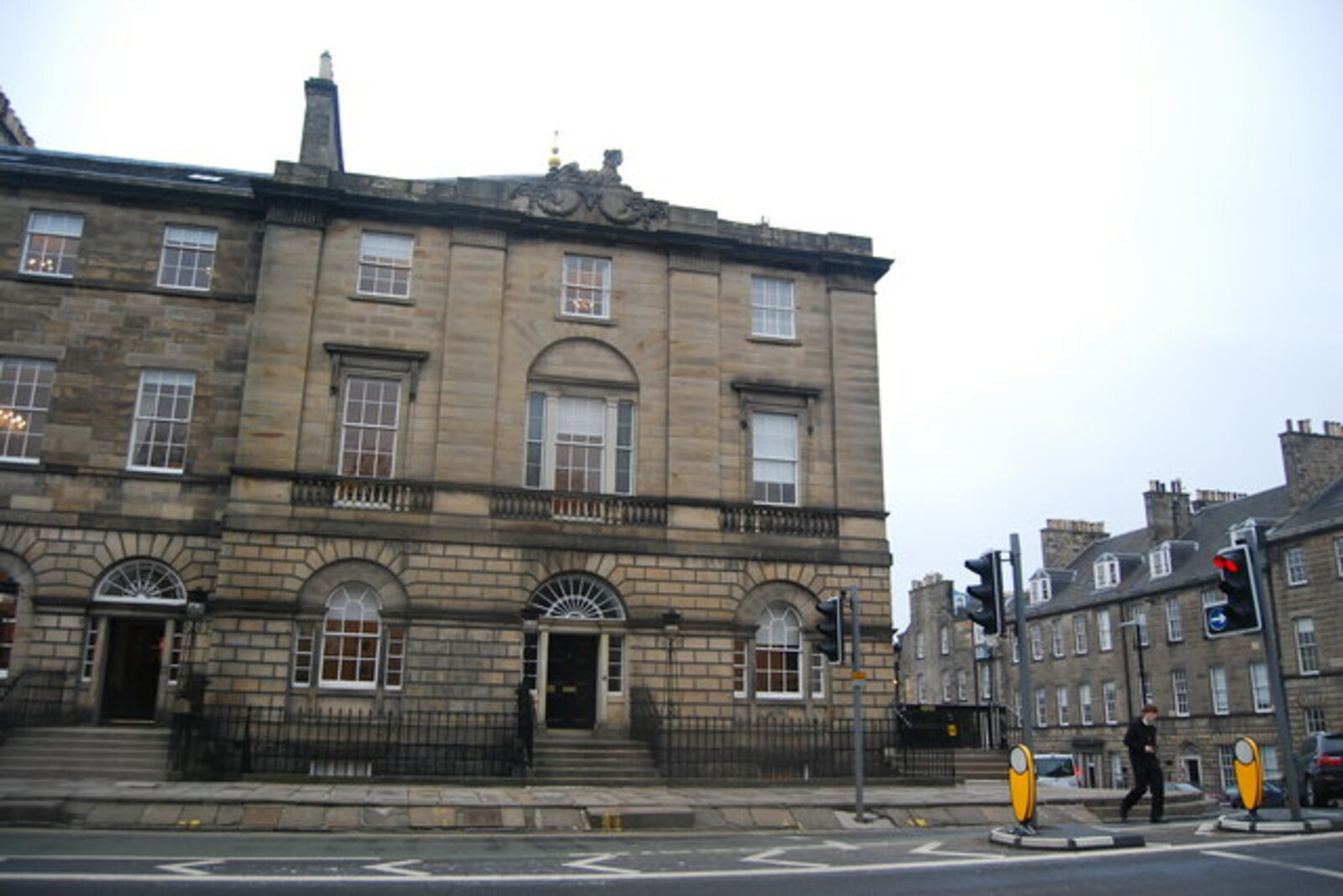 A row of Georgian houses on Charlotte Square; among them is Georgian House with a National Trust for Scotland sign.