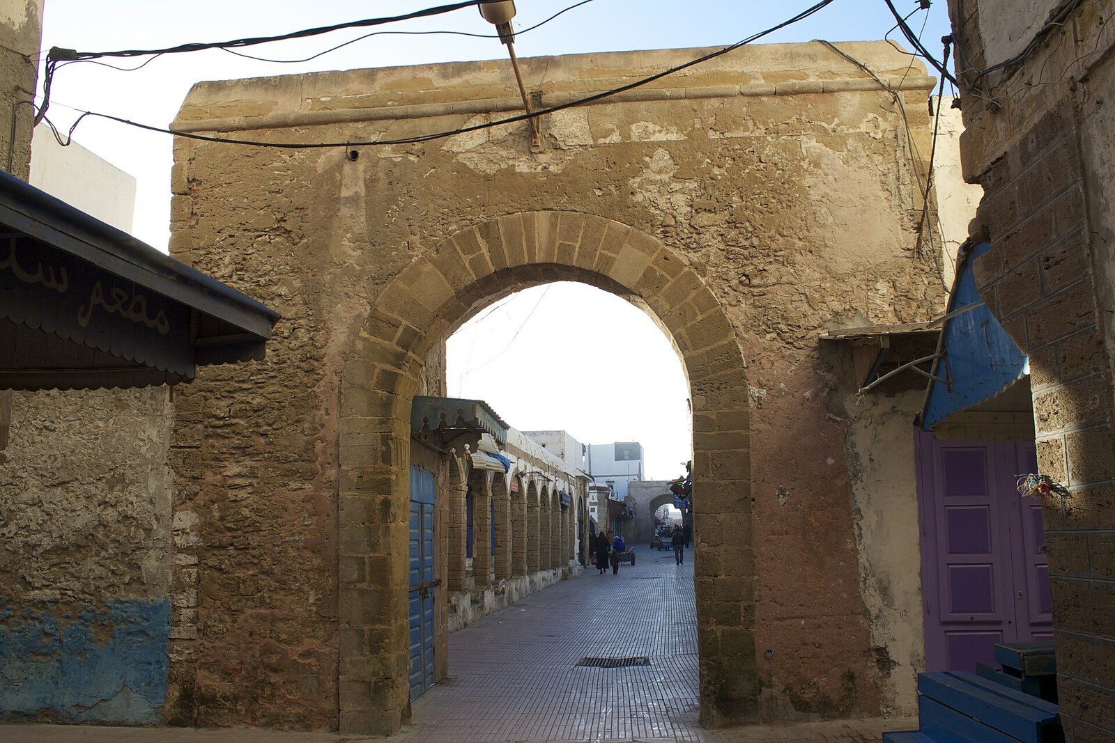 The arched entrance and straight market passage of Souk Jdid in Essaouira.