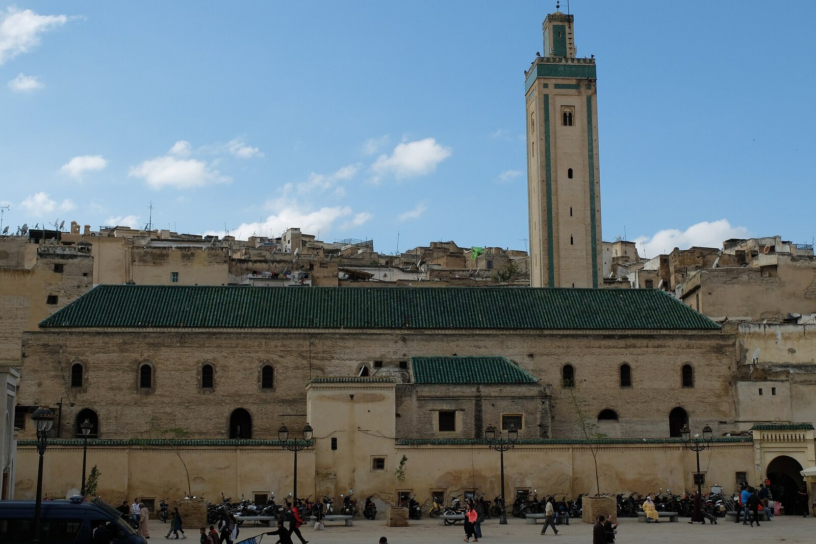 Rcif Mosque with its tall minaret rises above Place Rcif in the Medina of Fez