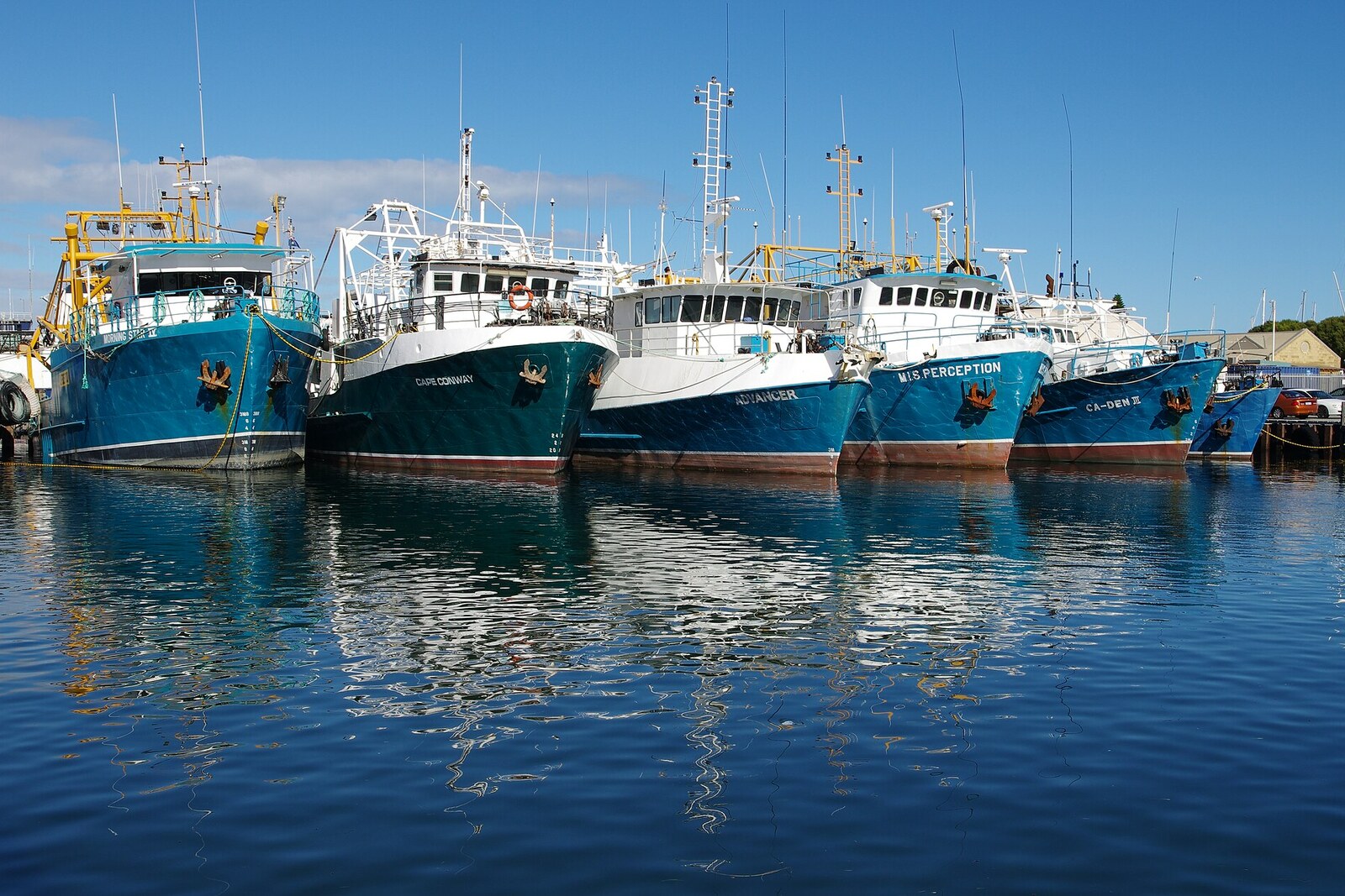 Working fishing boats in Fremantle harbor.