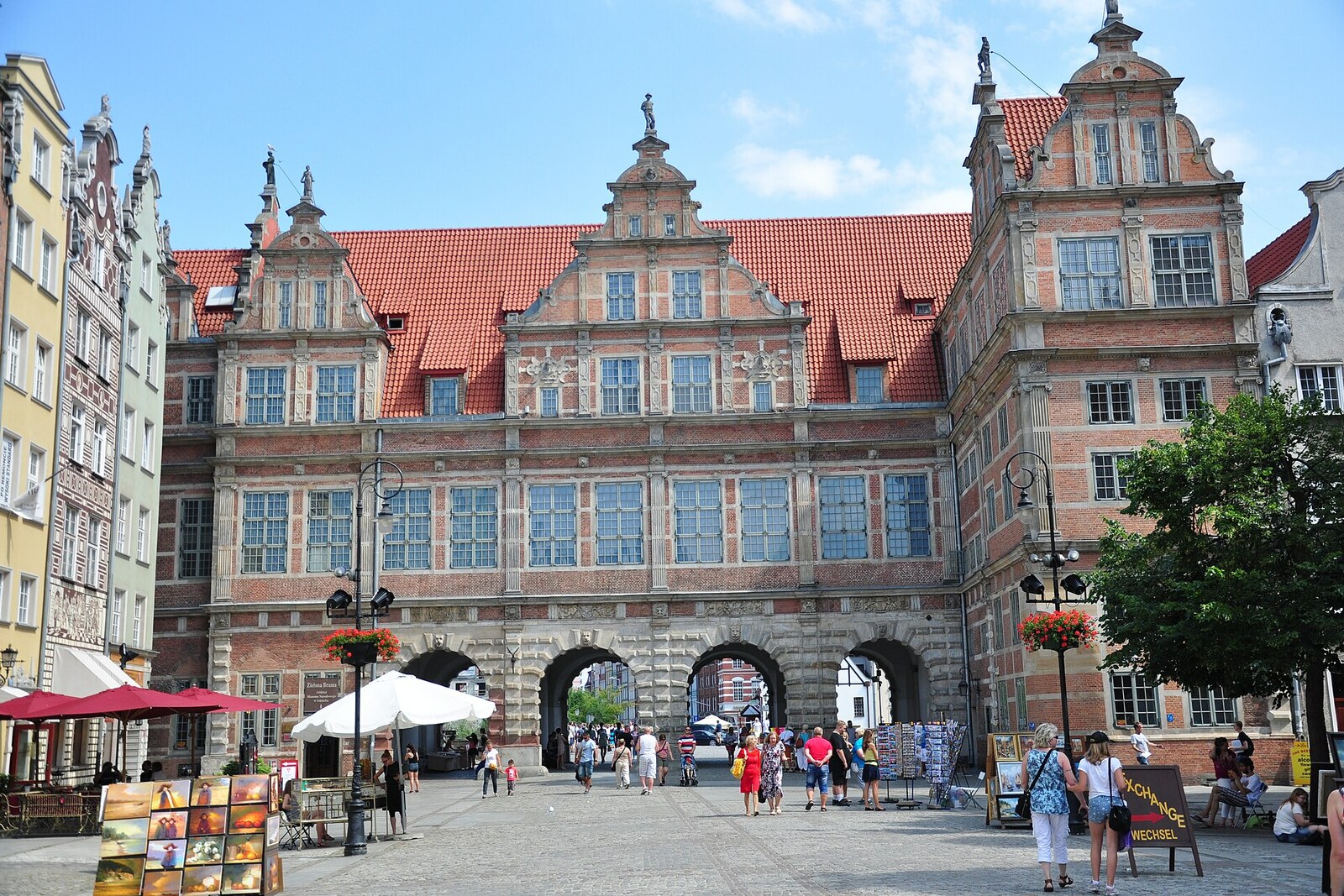Gdańsk's Green Gate with four arched passageways and tall gables.