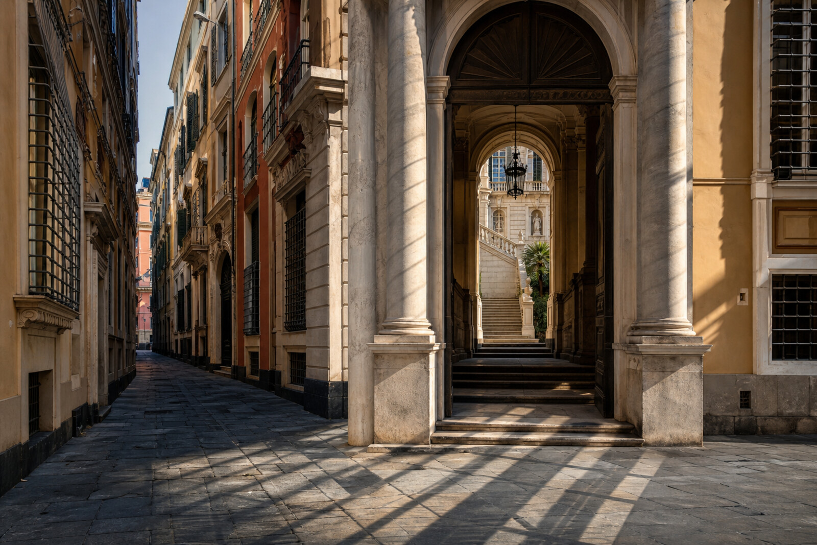 A narrow view along Via Garibaldi, with palace facades, a portal, and an abstract motif of registry lines.