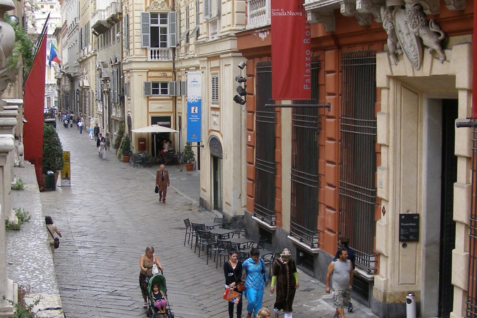 View along Via Garibaldi between tall palace façades.