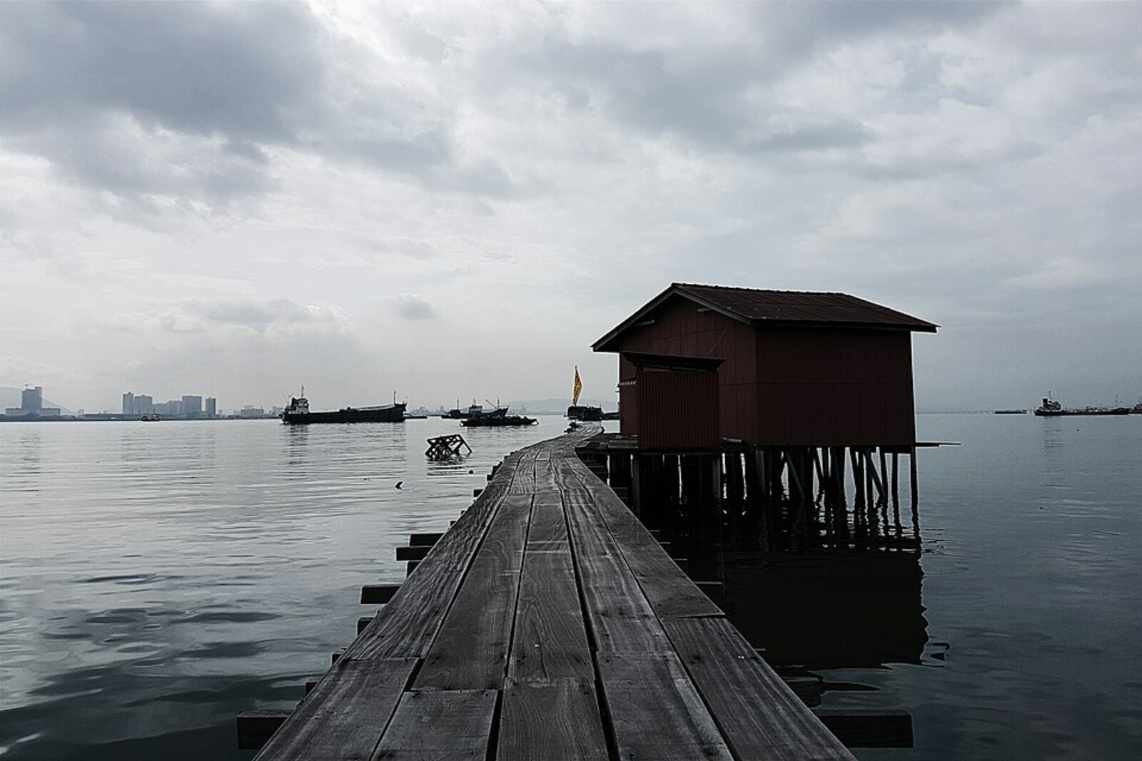 Overall view of the wooden decks of the Clan Jetties above the water in George Town
