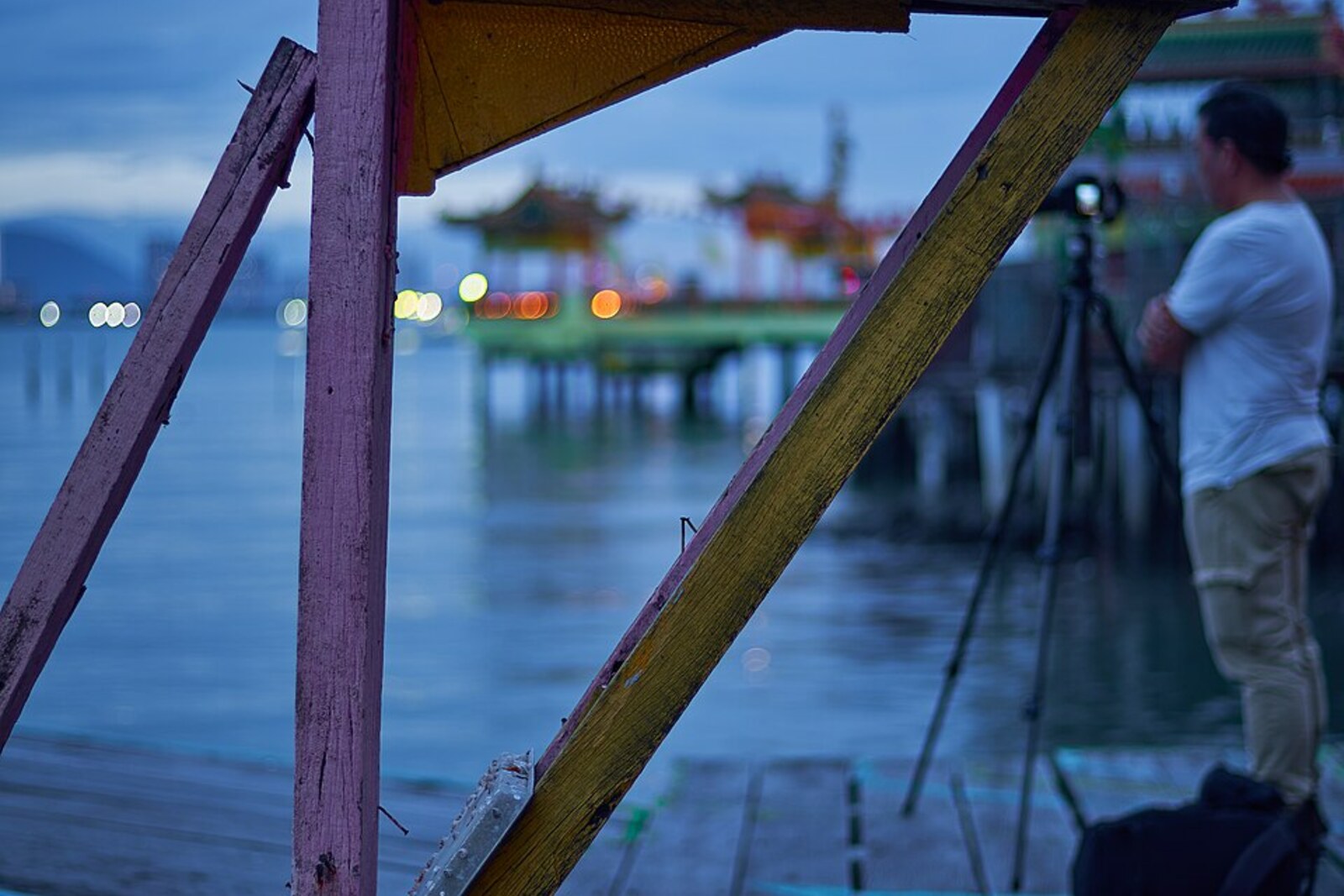 Yeoh Clan Jetties in Penang, a ritual scene by the water