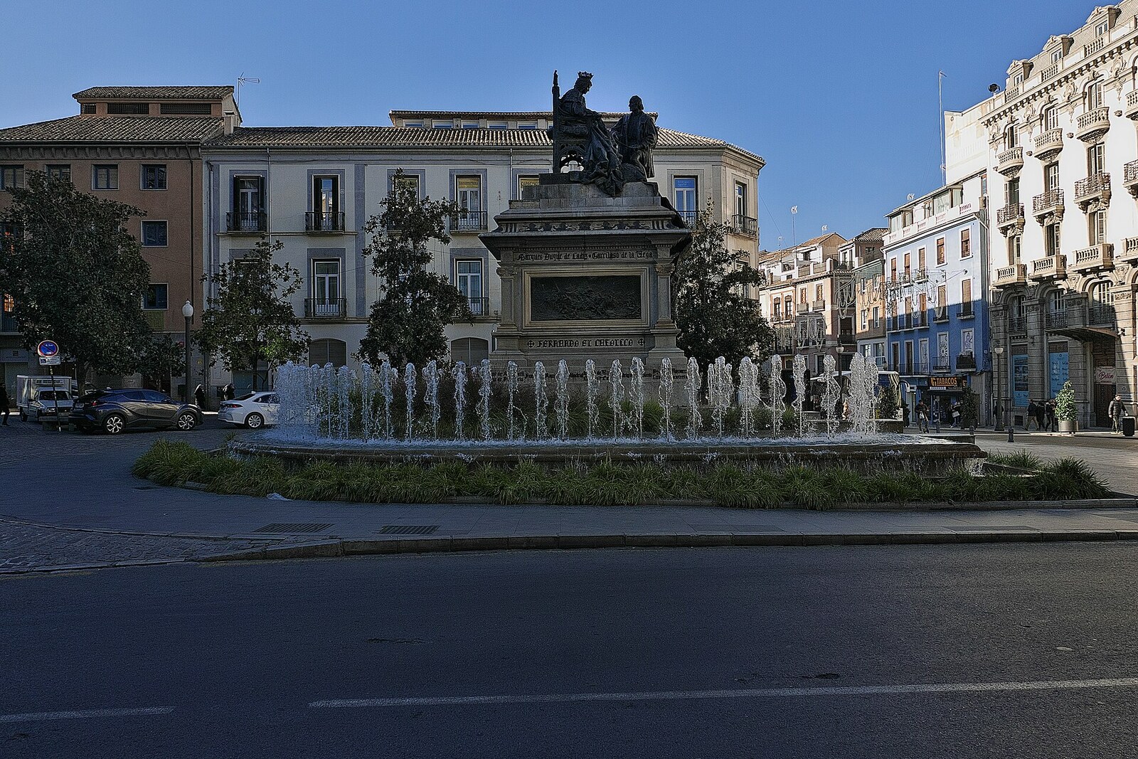 Bronze monument to Isabella I of Castile and Christopher Columbus on Plaza Isabel la Católica in Granada.