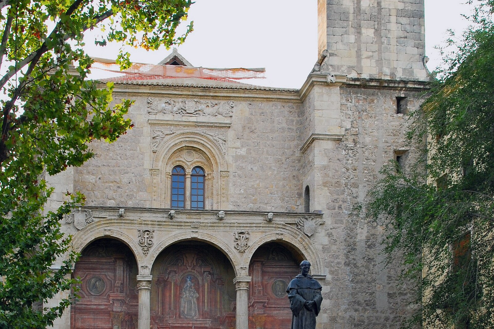 Facade of Santo Domingo Church (Santa Escolástica Parish) on Plaza de Santo Domingo in Granada.