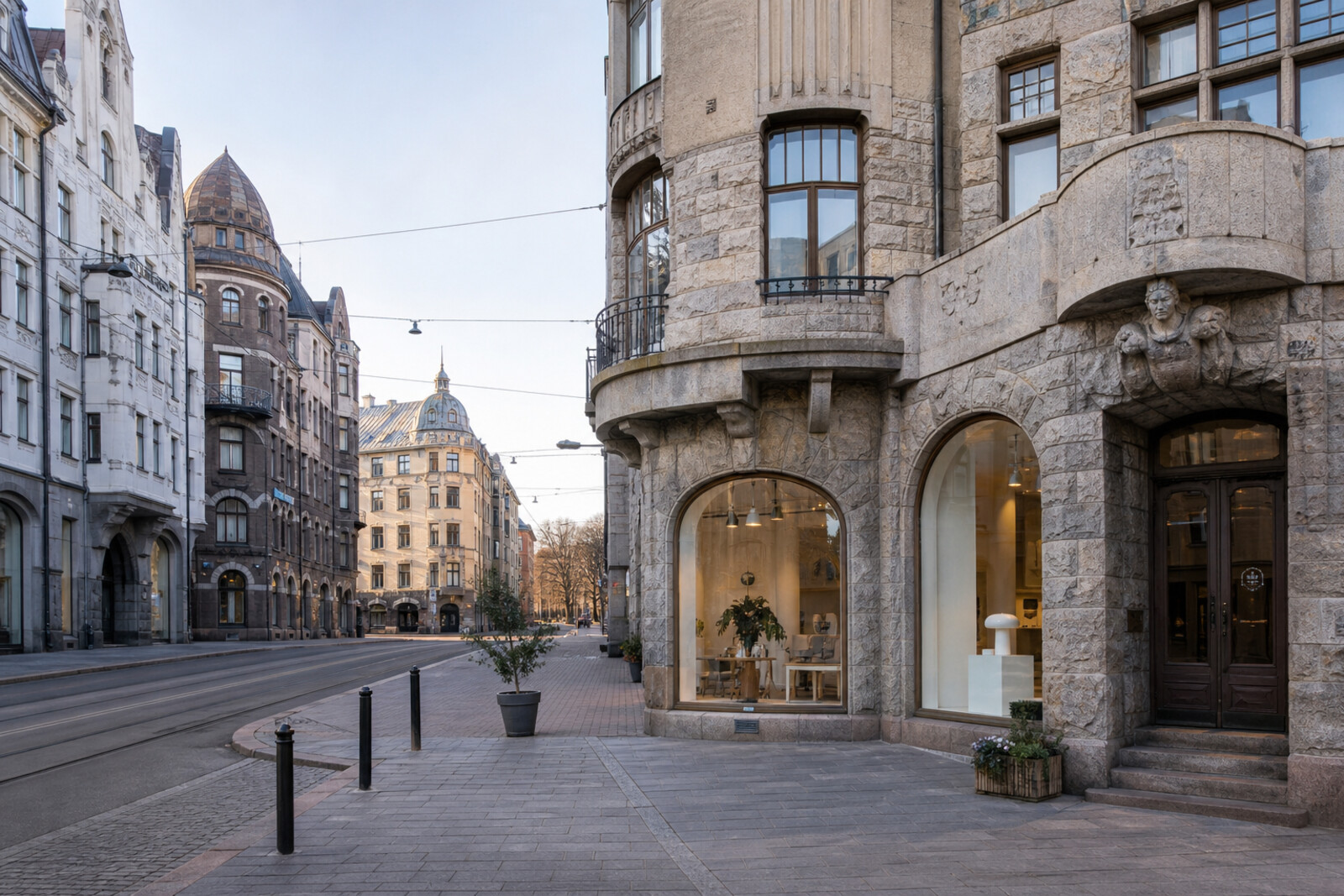 Illustrated cover with imagined Jugend-style façades, shop windows, and a sea horizon