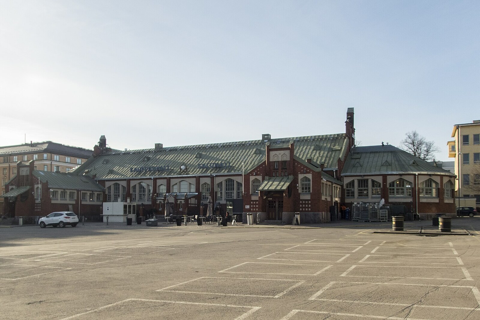 The red-brick building of Hietalahti Market Hall on a sunny day