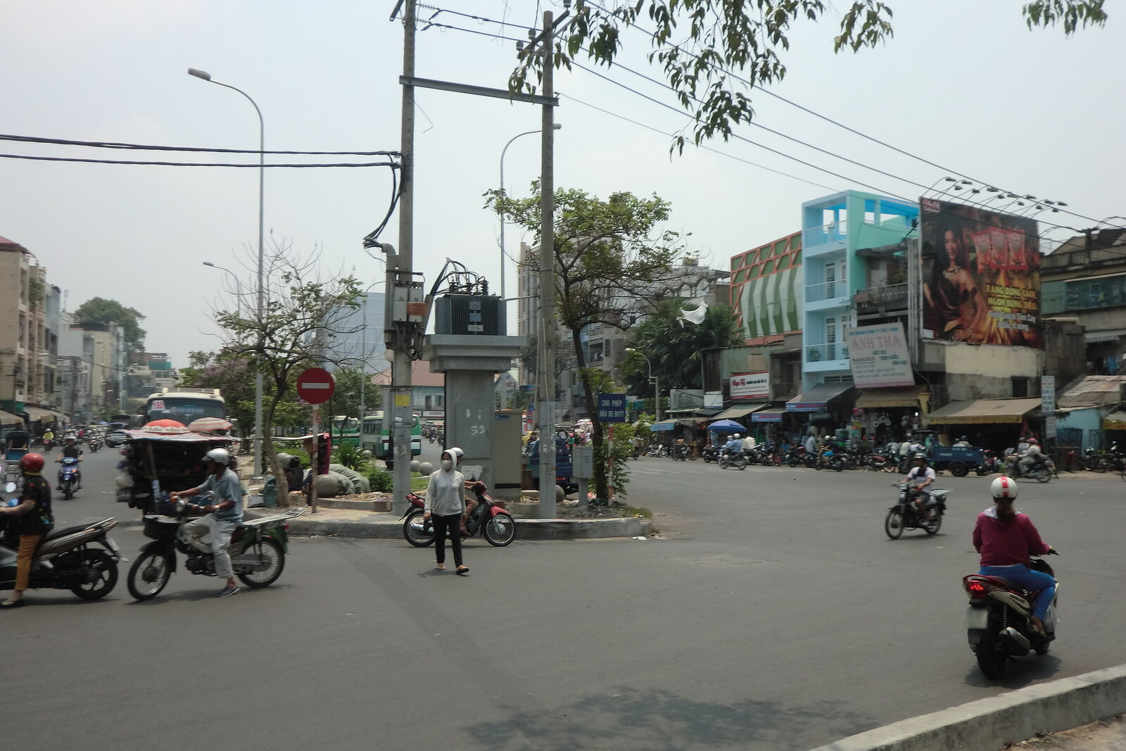 Hai Thuong Lan Ong Street with herbal-medicine shops and signs bearing Chinese characters.